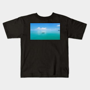 Aerial panoramic view of fishing boat on emerald sea Kids T-Shirt